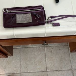 Purple Coach wallet wristlet